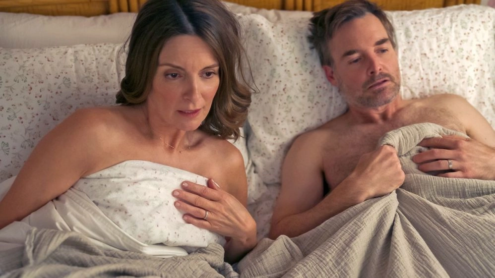 syndrome sexuel-génito-urinaire-ménopause Cadre des Quatre Saisons comme exemple d'un couple d'âge mûr au lit après avoir eu des relations sexuelles, symbole du syndrome génito-urinaire de la ménopause