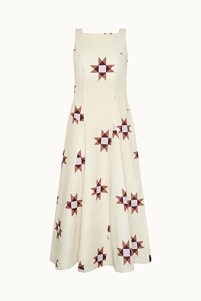 Robe à fond blanc et détail étoile MarÀvic.