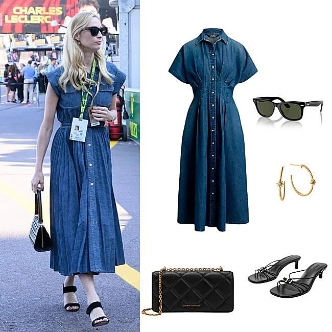Béatrice Borrome avec une robe chemise en jean et des accessoires noirs.